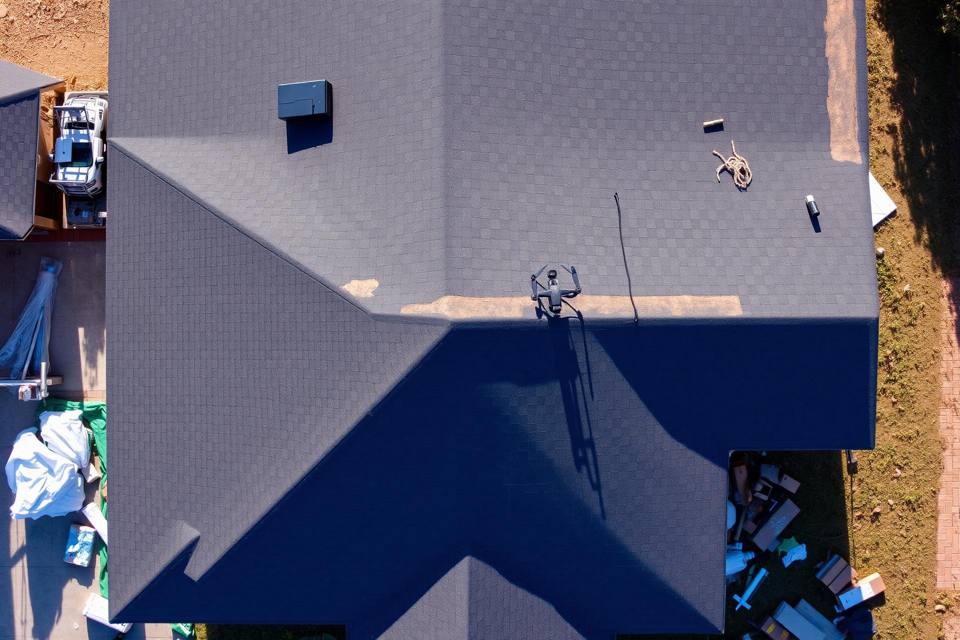 Aerial view of a roof installation in DFW